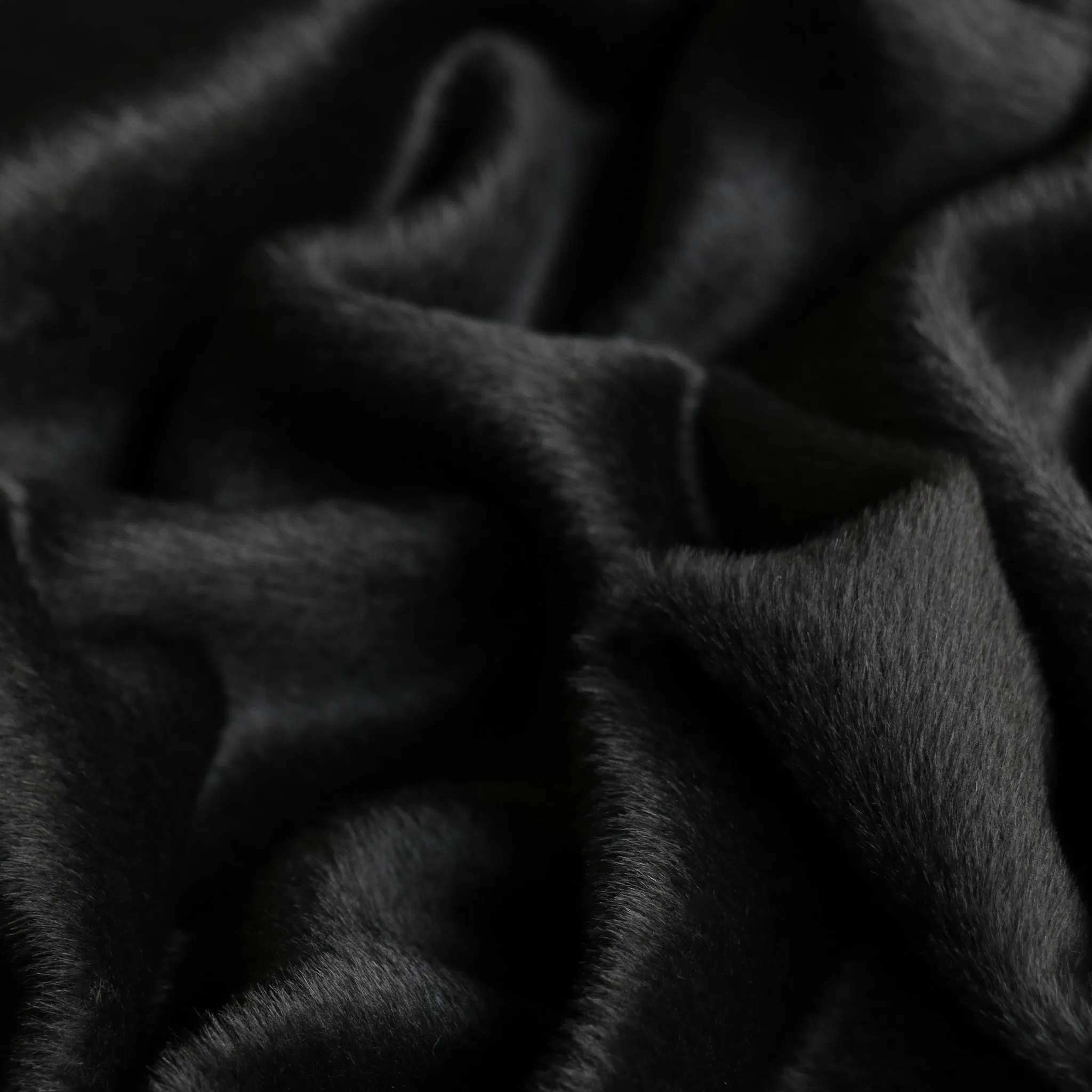 Suri Alpaca Black Coating